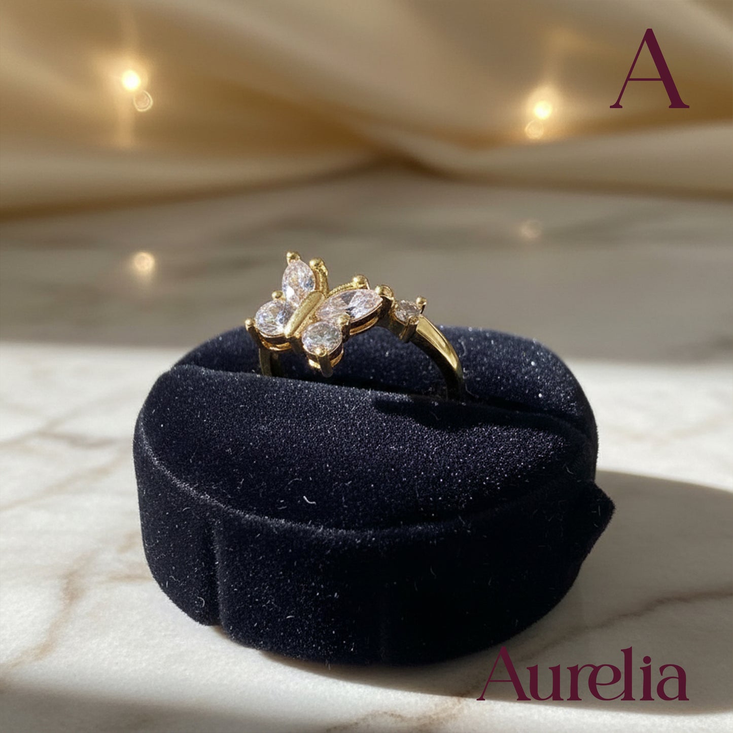 ANILLO ANTIESTRES MARIPOSA BRILLANTE BLANCO