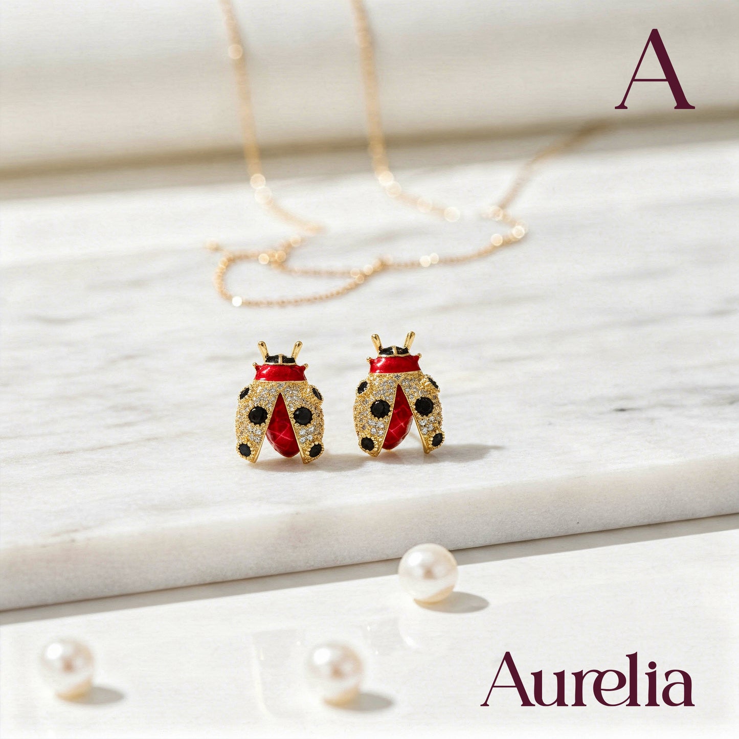 ARETES MARIQUITA GRANDE DETALLE NEGRO Y DORADO