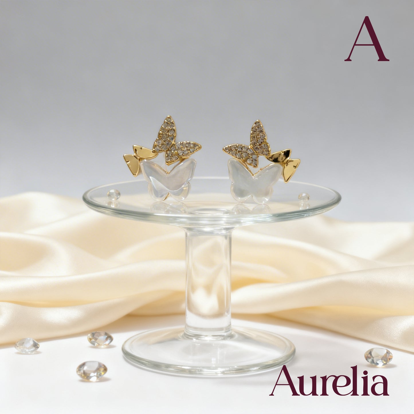 ARETES 3 MARIPOSAS BLANCA Y BRILLANTE