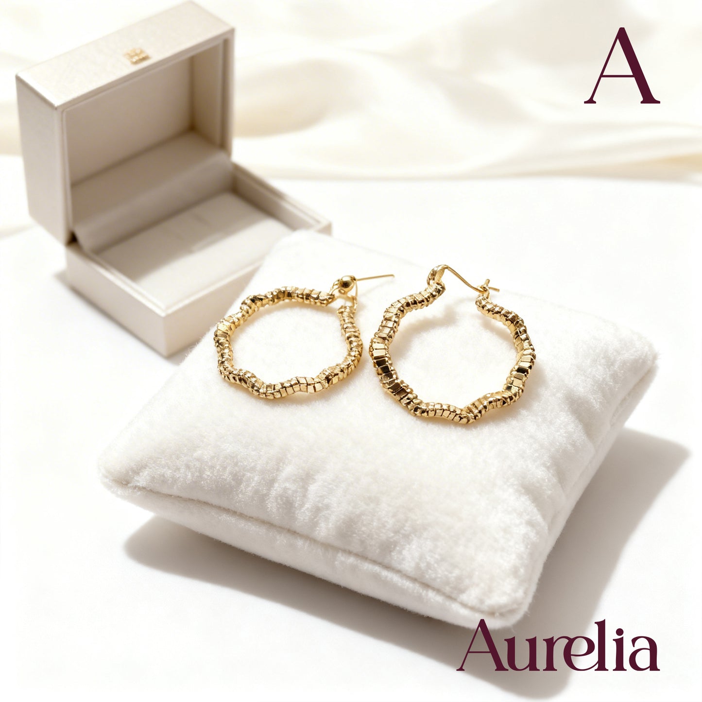 ARETES CANDONGAS CURVAS CON TEXTURA