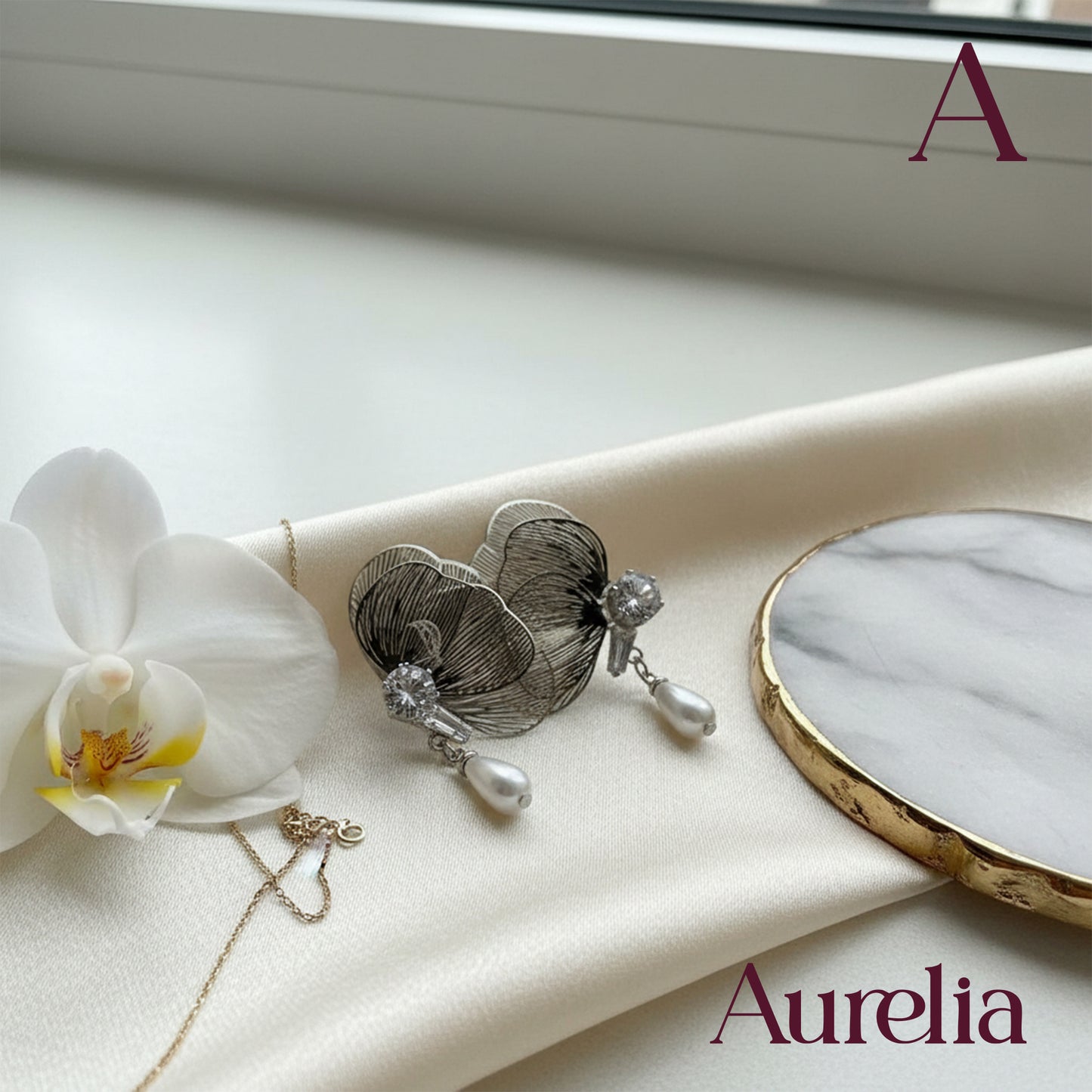 ARETES MARIPOSA LINEAS CON BRILLANTE Y COLGANTE PERLA