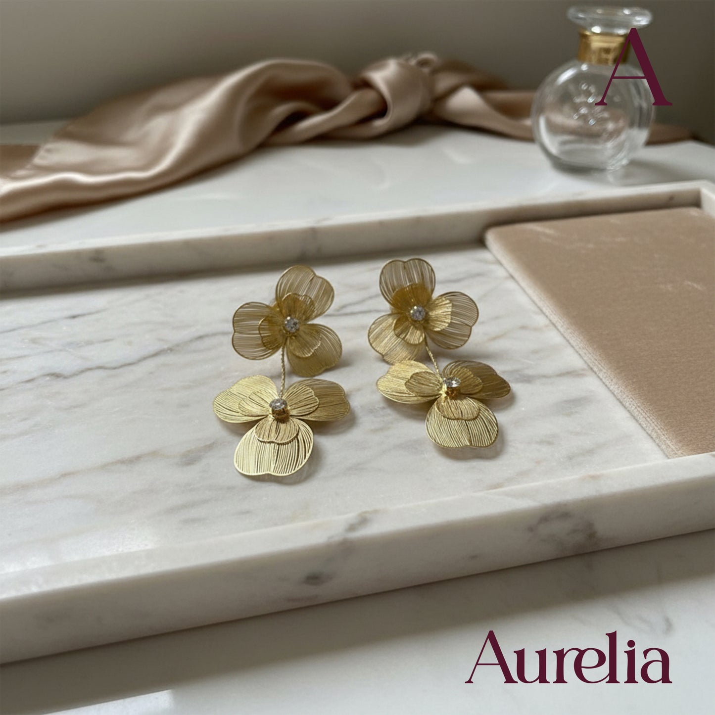 ARETES DOBLE FLOR GRANDE COLGANTE LINEAS