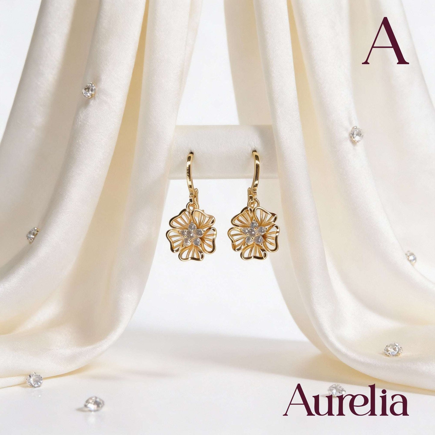 ARETES LARGOS FLOR Y MINI FLOR BRILLANTE BLANCO