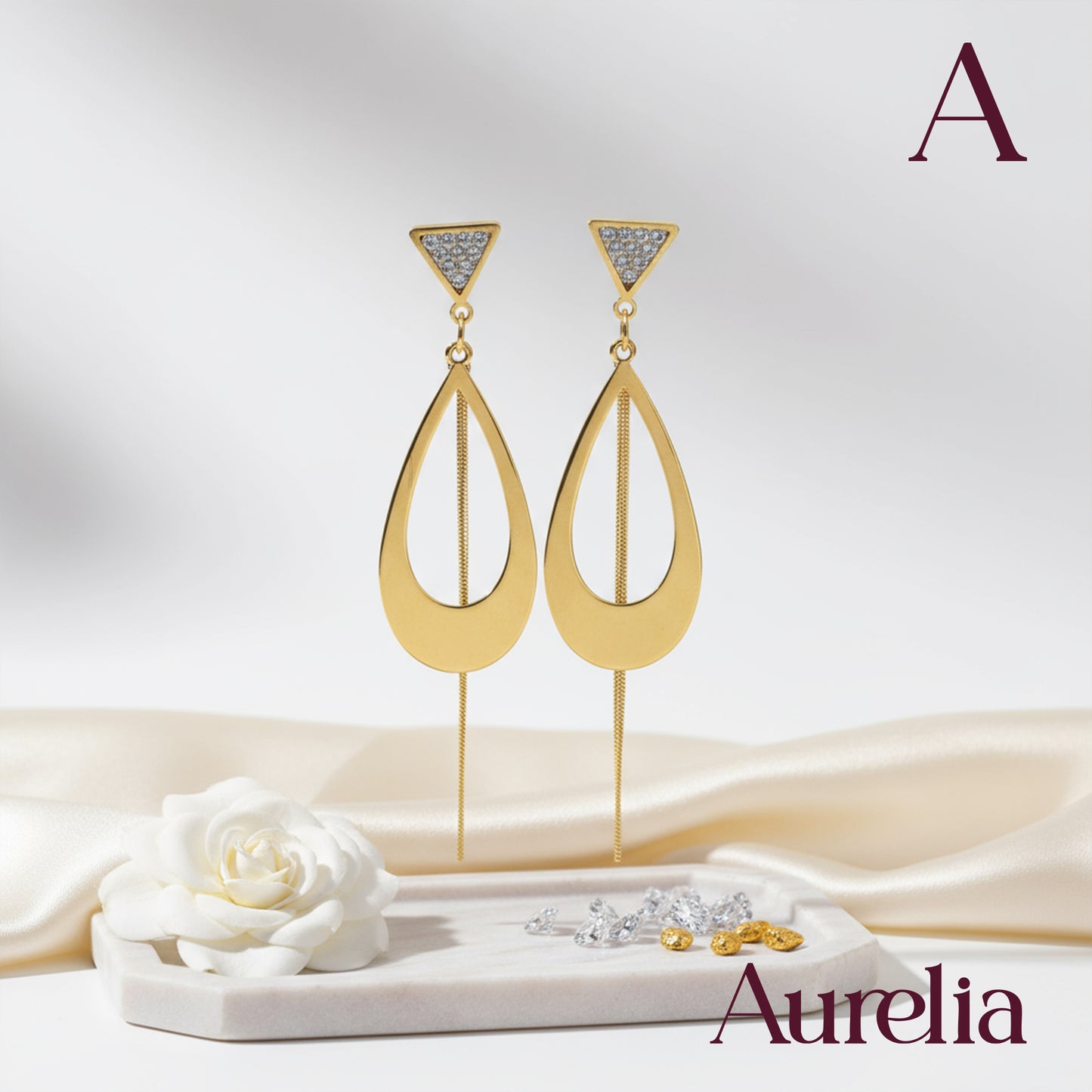 ARETES LARGOS GOTA CON TRIANGULOS PLATEADOS