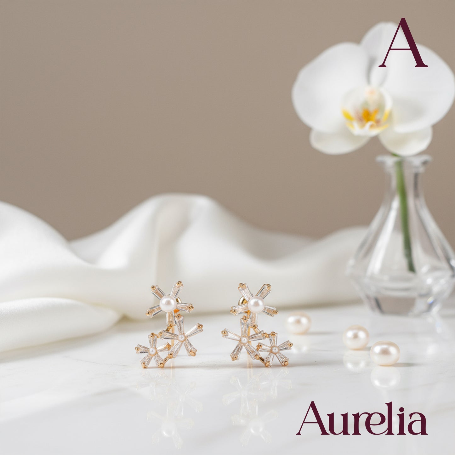 ARETES 3 FLORES Y PERLA
