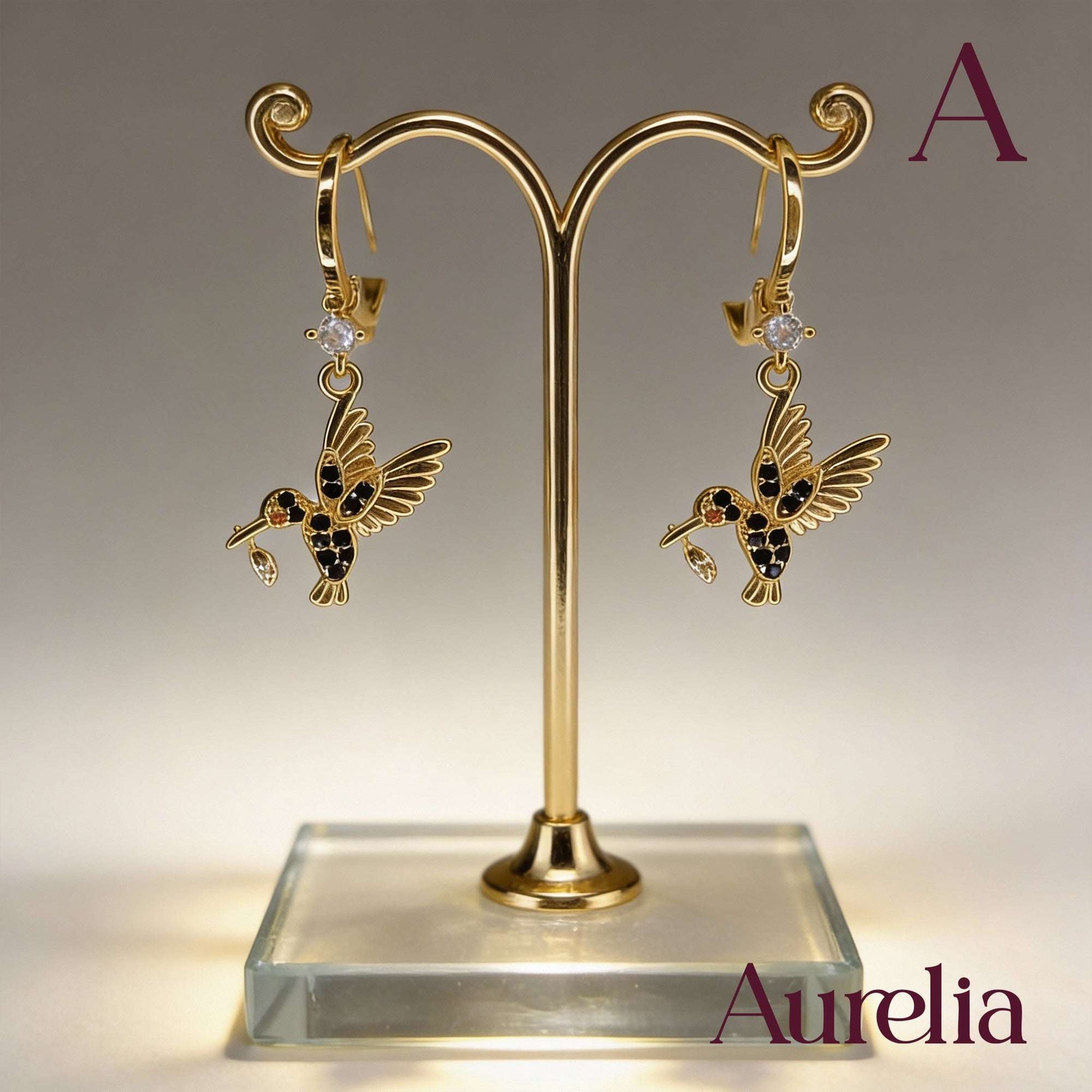 ARETES LARGOS COLIBRI NEGRO Y BRILLANTE