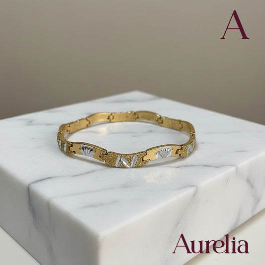 PULSERA TIRA CURVAS DETALLE CORONA PLATEADO