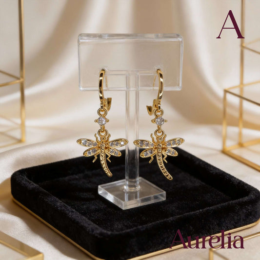 ARETES LARGOS LIBELULA PUNTOS Y BRILLANTES BLANCOS