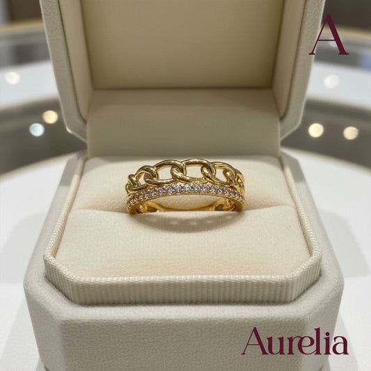 ANILLO GRUESO TIRA BRILLANTES Y ENTRELAZOS