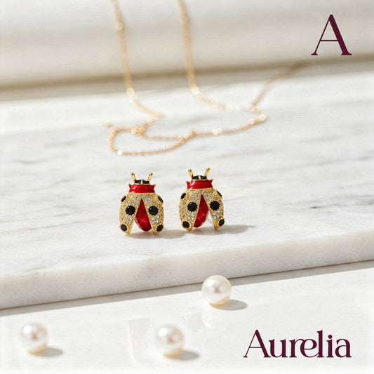 ARETES MARIQUITA GRANDE DETALLE NEGRO Y DORADO
