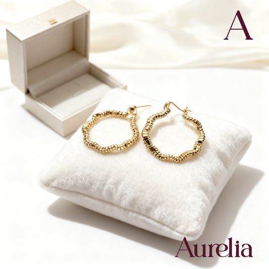 ARETES CANDONGAS CURVAS CON TEXTURA