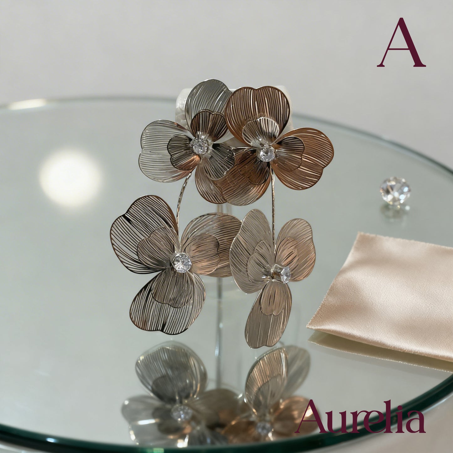 ARETES DOBLE FLOR GRANDE COLGANTE LINEAS