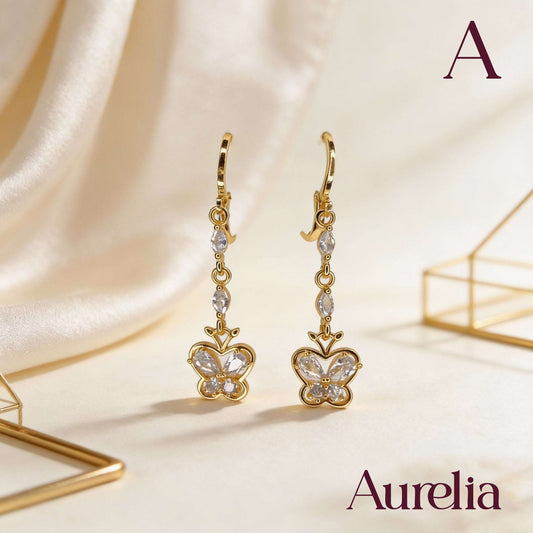 ARETES LARGOS MARIPOSA BLANCA Y BRILLANTES BLANCOS