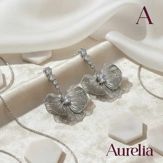 ARETES MEDIA FLOR Y 4 BRILLANTES