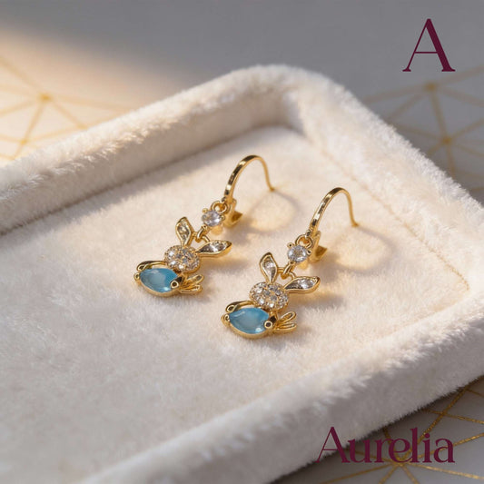 ARETES LARGOS CONEJO Y ZANAHORIA BRILLANTE AZUL