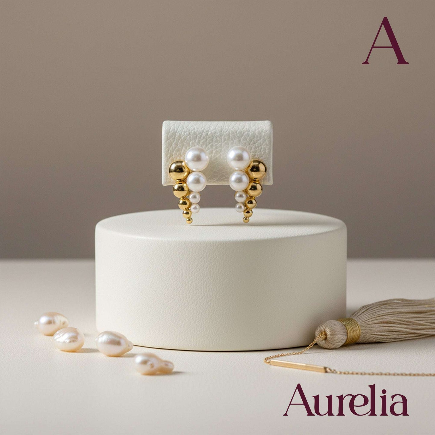 ARETES 4 BOLAS CON BLANCO