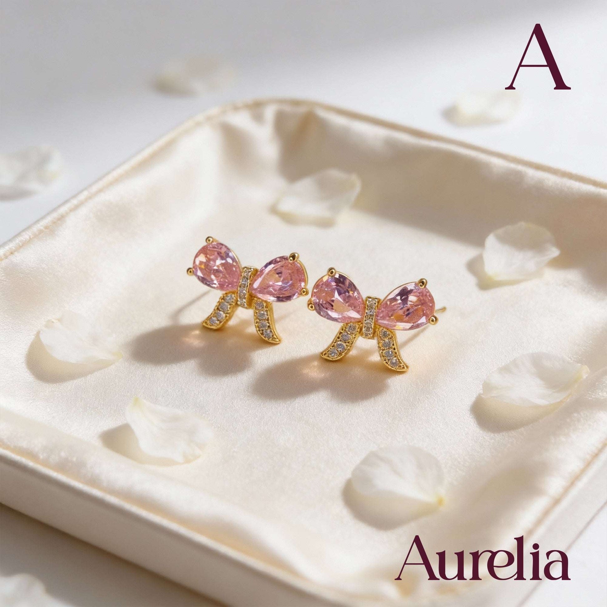 ARETES MOÑO BRILLANTE ROSADO