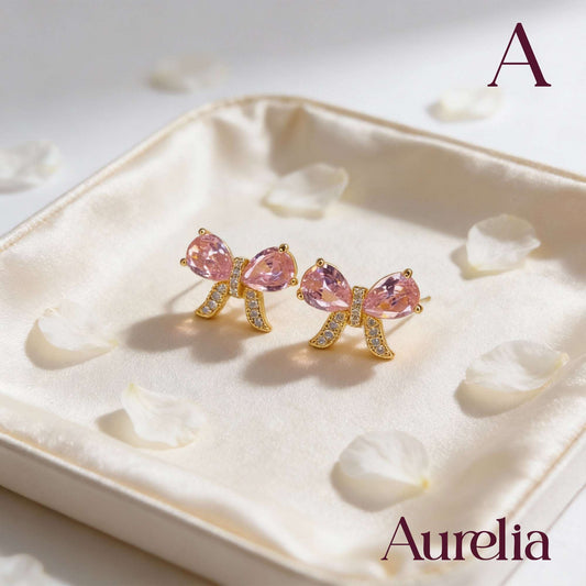ARETES MOÑO BRILLANTE ROSADO