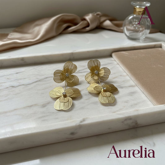 ARETES DOBLE FLOR GRANDE COLGANTE LINEAS
