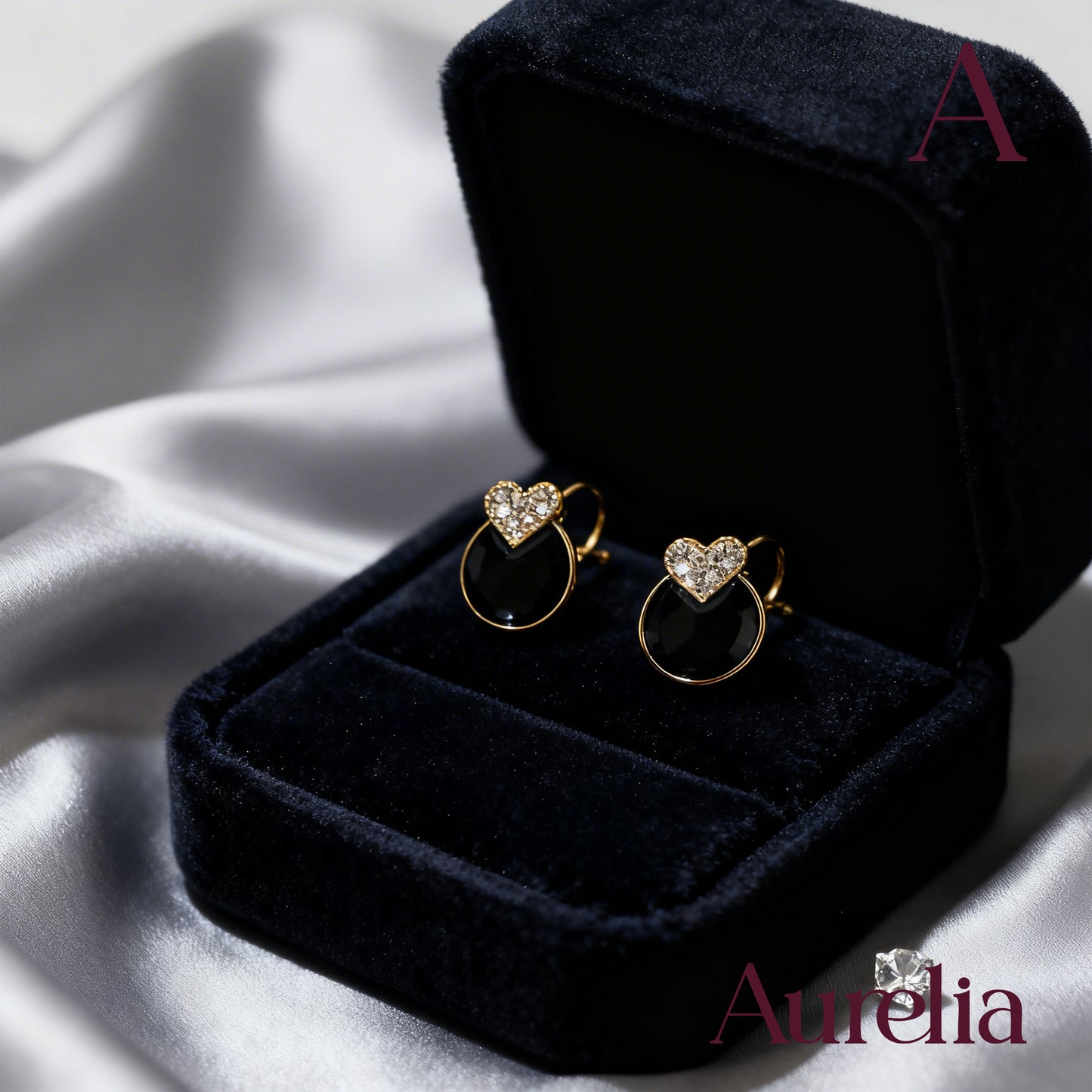 ARETES CIRCULO NEGRO Y MINI CORAZON BRILLANTE