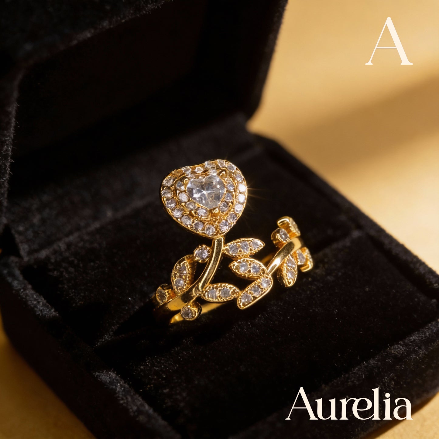 ANILLO GRANDE HOJAS Y CORAZON BRILLANTE