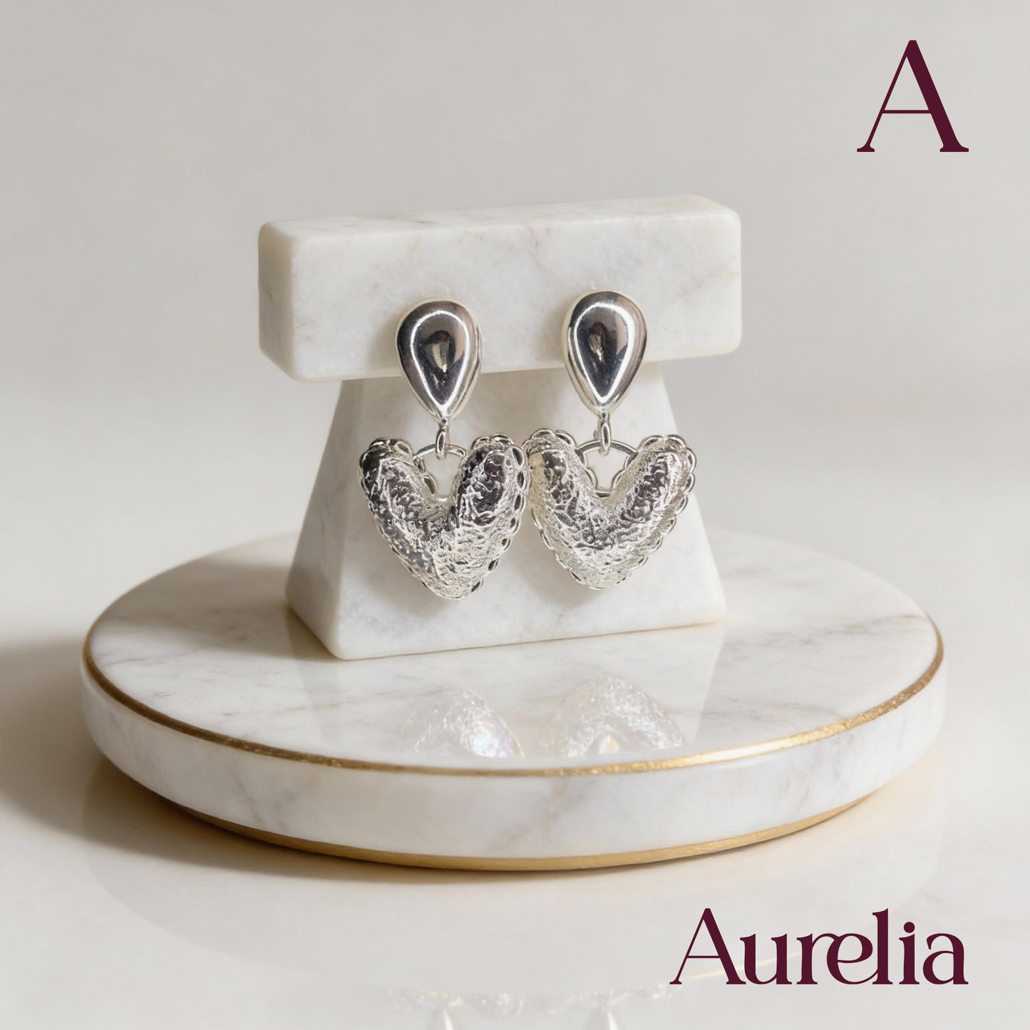 ARETES CORAZON TEXTURIZADO Y GOTA