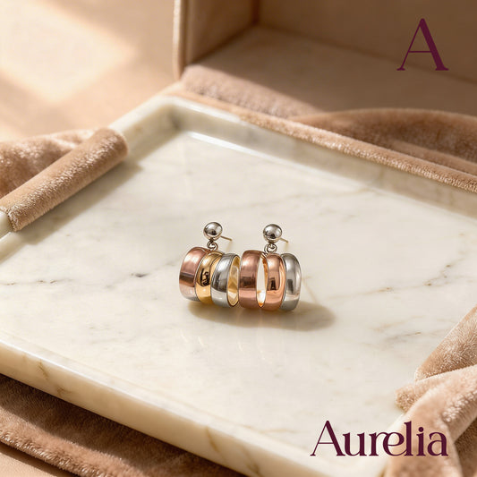 ARETES GRANDE CURVA PLATEADO Y ORO ROSA