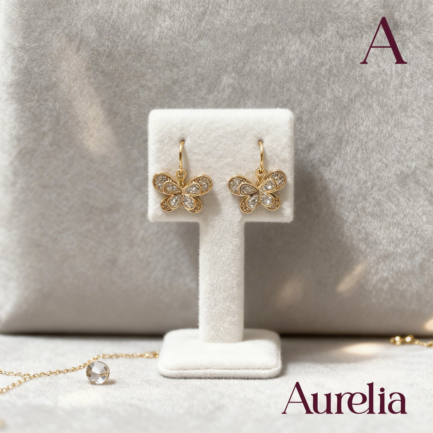 ARETES DOBLE MARIPOSA BRILLANTE