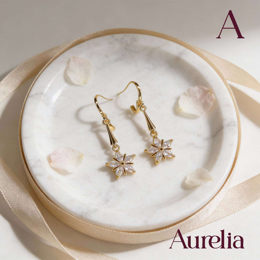 ARETES LARGOS FLOR BLANCA Y CONO