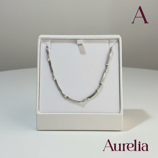 COLLAR CADENA LARGA TEJIDO MINI