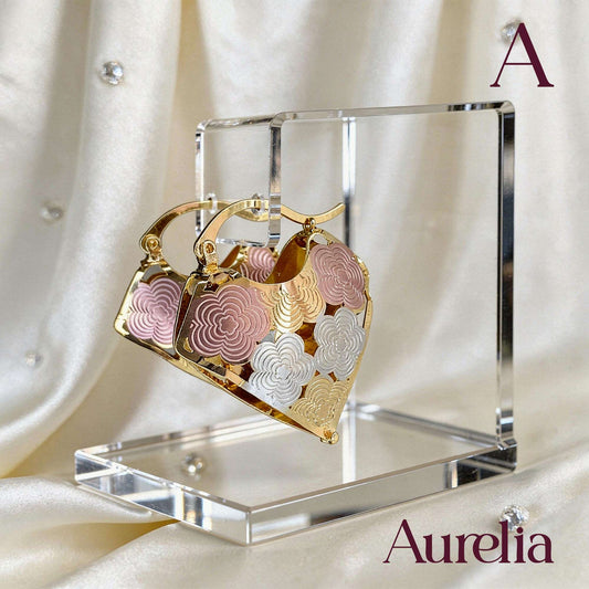 ARETES CANDONGAS TRIANGULO FLORES PLATEADO Y ORO ROSA