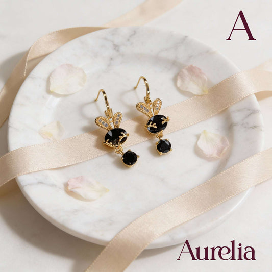 ARETES LARGOS CONEJO Y COLGANTE NEGRO