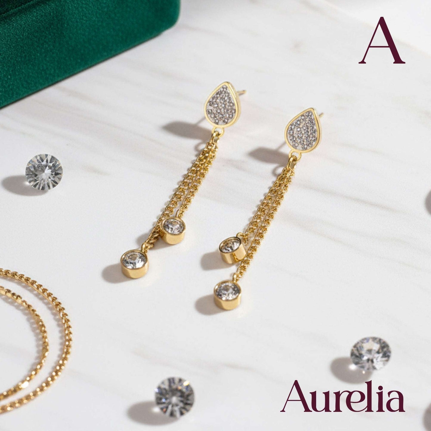 ARETES LARGOS GOTA Y BOLAS PLATEADAS