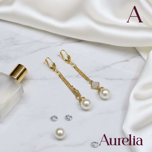 ARETES LARGOS CORAZÓN CON MINI BOLAS