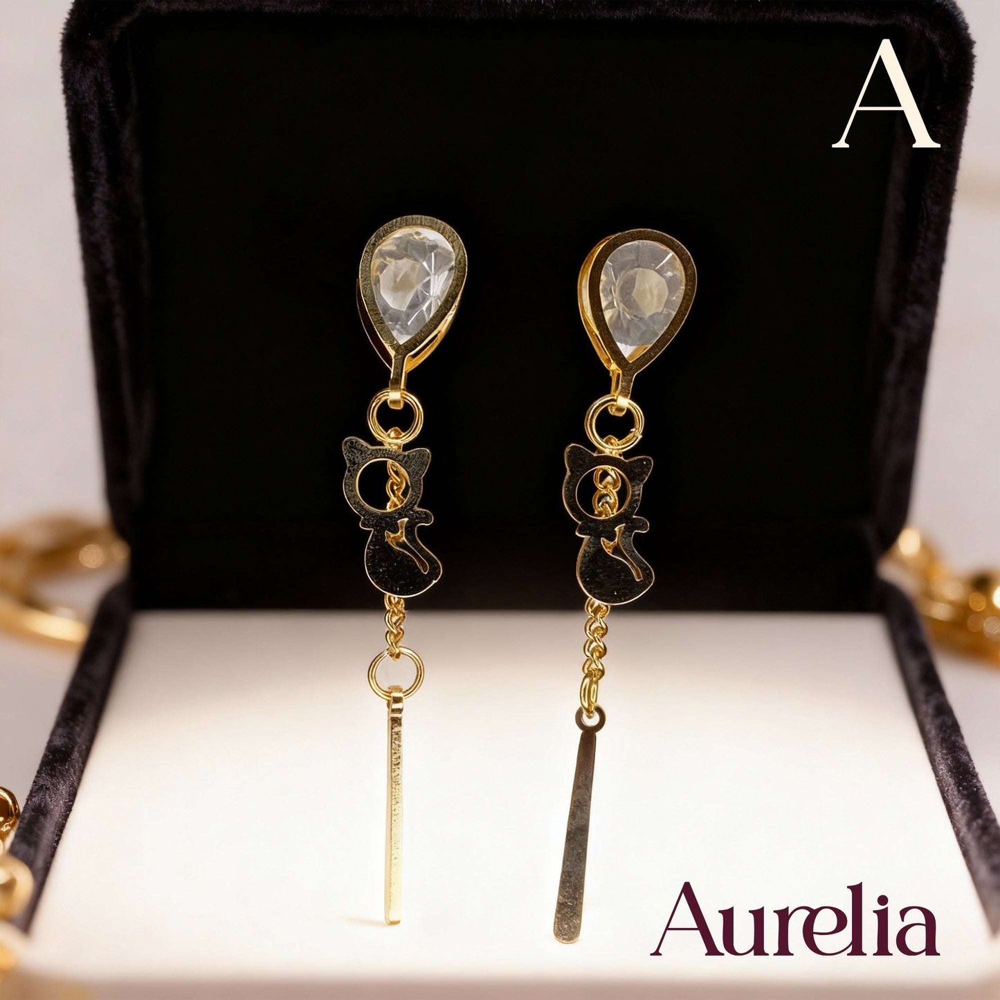 ARETES LARGOS GATO Y PALO