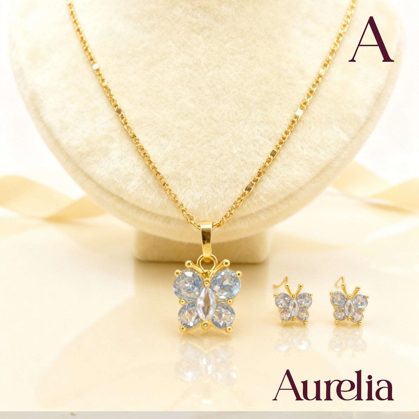 COLLAR SET MARIPOSA Y TOPOS BRILLANTE BLANCO