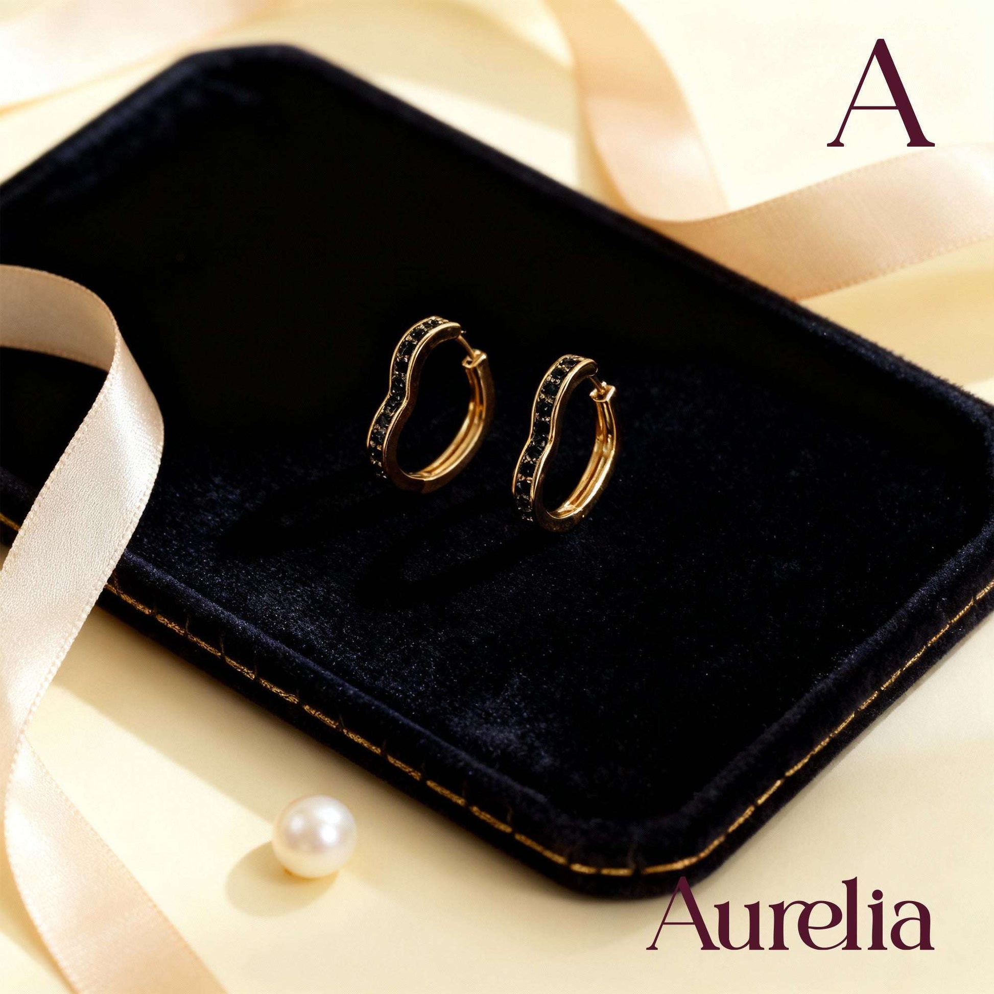 ARETES CANDONGA CORAZÓN BRILLANTE NEGRO