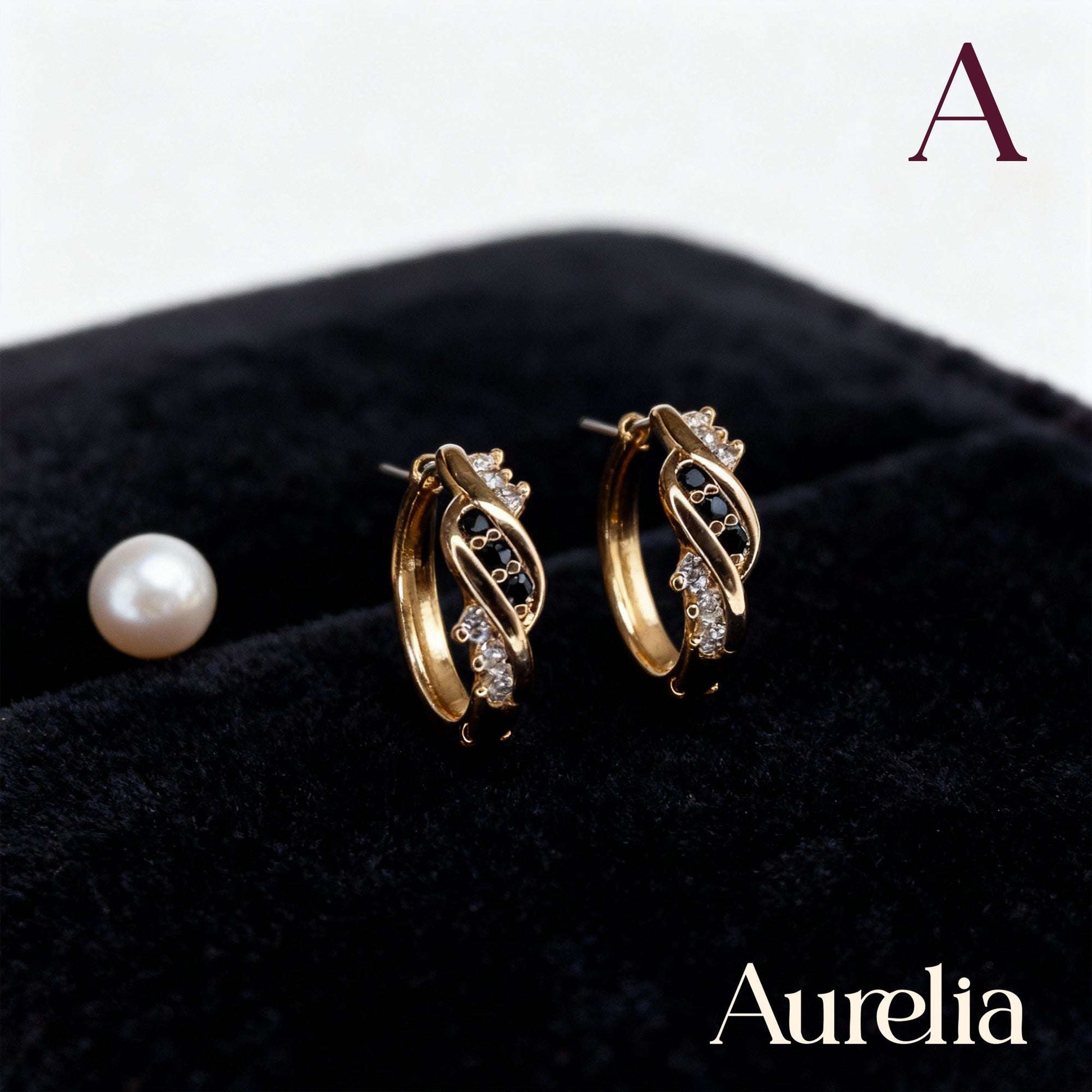 ARETES CANDONGA ENTRELAZOS BRILLANTE NEGRO Y PLATEADO
