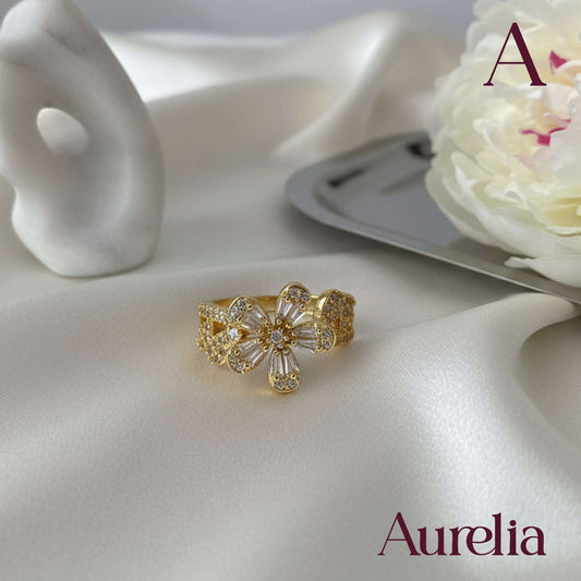 ANILLO GRUESO FLOR Y PETALOS BRILLANTE BLANCO