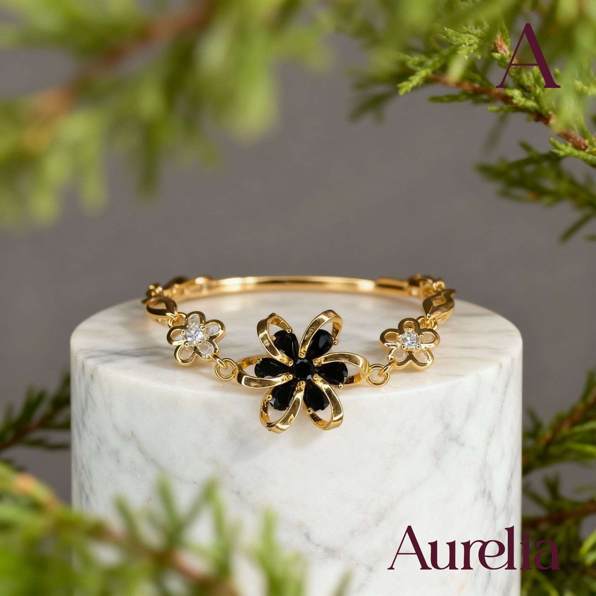 PULSERA TIRA FLORES DETALLE NEGRO
