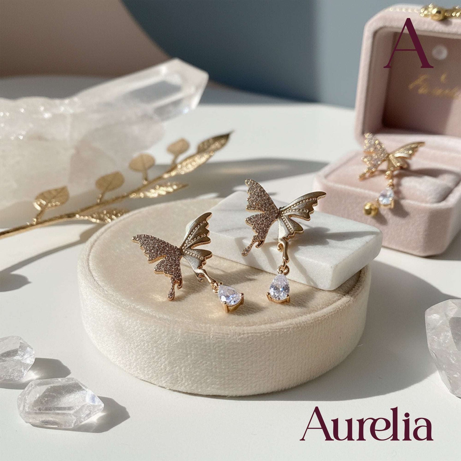 ARETES MARIPOSA BRILLANTE BLANCO Y COLGANTE