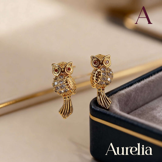 ARETES TOPOS BUHO BRILLANTE BLANCO